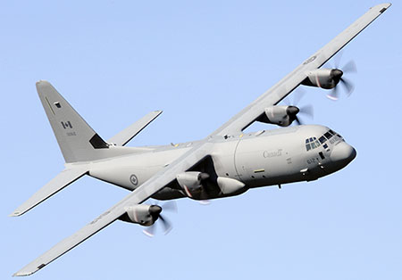 This photograph shows a CC-130J Hercules aircraft